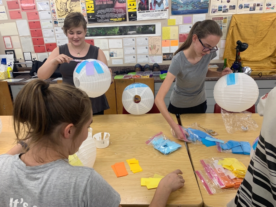 Art students making eyeball lanterns. Art students making eyeball lanterns.